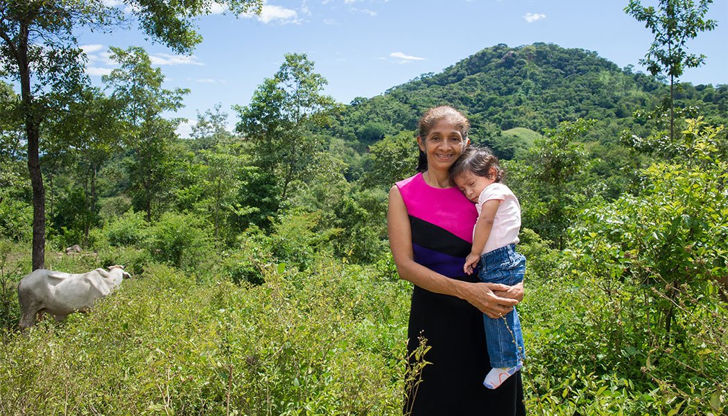 Anarda-Virginia-Davila-Nunez-holding-her-granddaughter