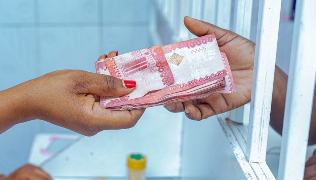 Addressing agent liquidity ensures that money can change hands at Happy Mtango's kiosk.