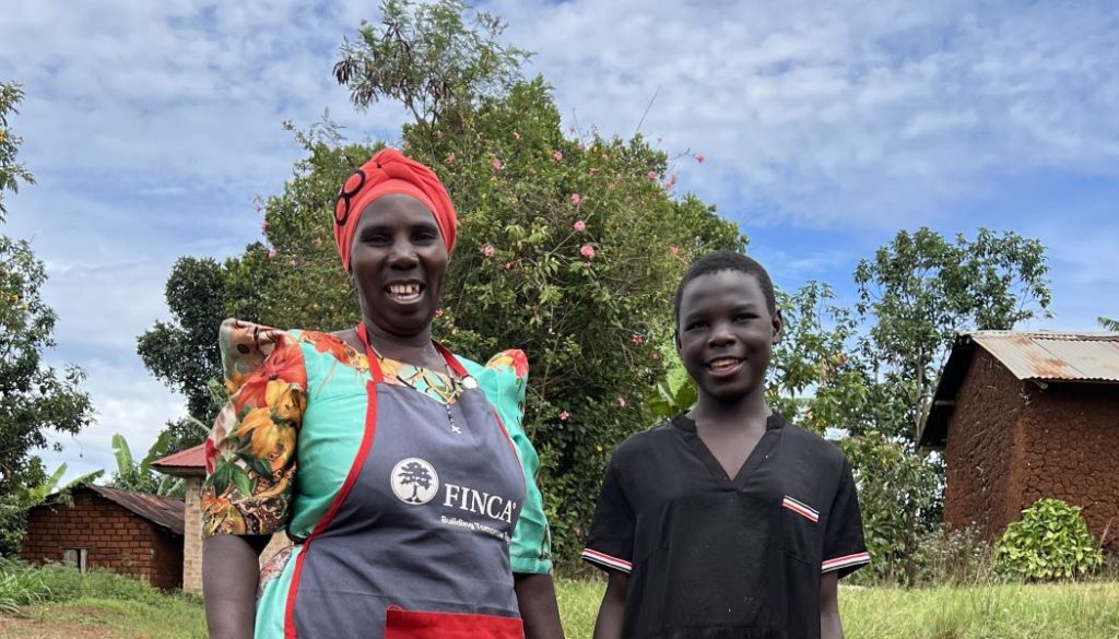 Resty Musoke and her granddaughter on Resty's farm in Uganda.