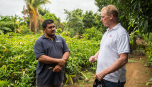 Rupert Scofield meets with a FINCA client and farmer in Nicaragua
