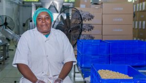 Salome Mbembati, an employee of YYTZ in Tanzania, is building resilience to external shocks.