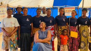 Women participants pose at conclusion of financial literacy in Zambia program